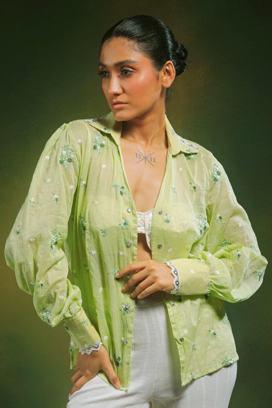 Light mint green oversized shirt by 66aura, casual fit with long sleeves and a relaxed style, displayed on a hanger.