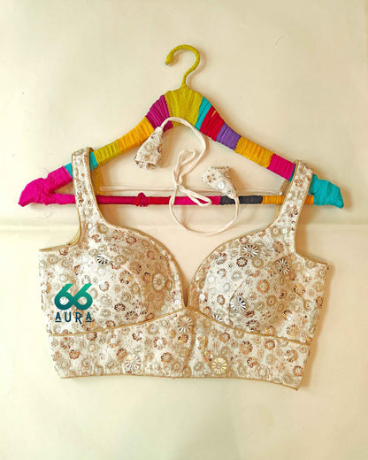 GLAM AURA SLEEVELESS BLOUSE