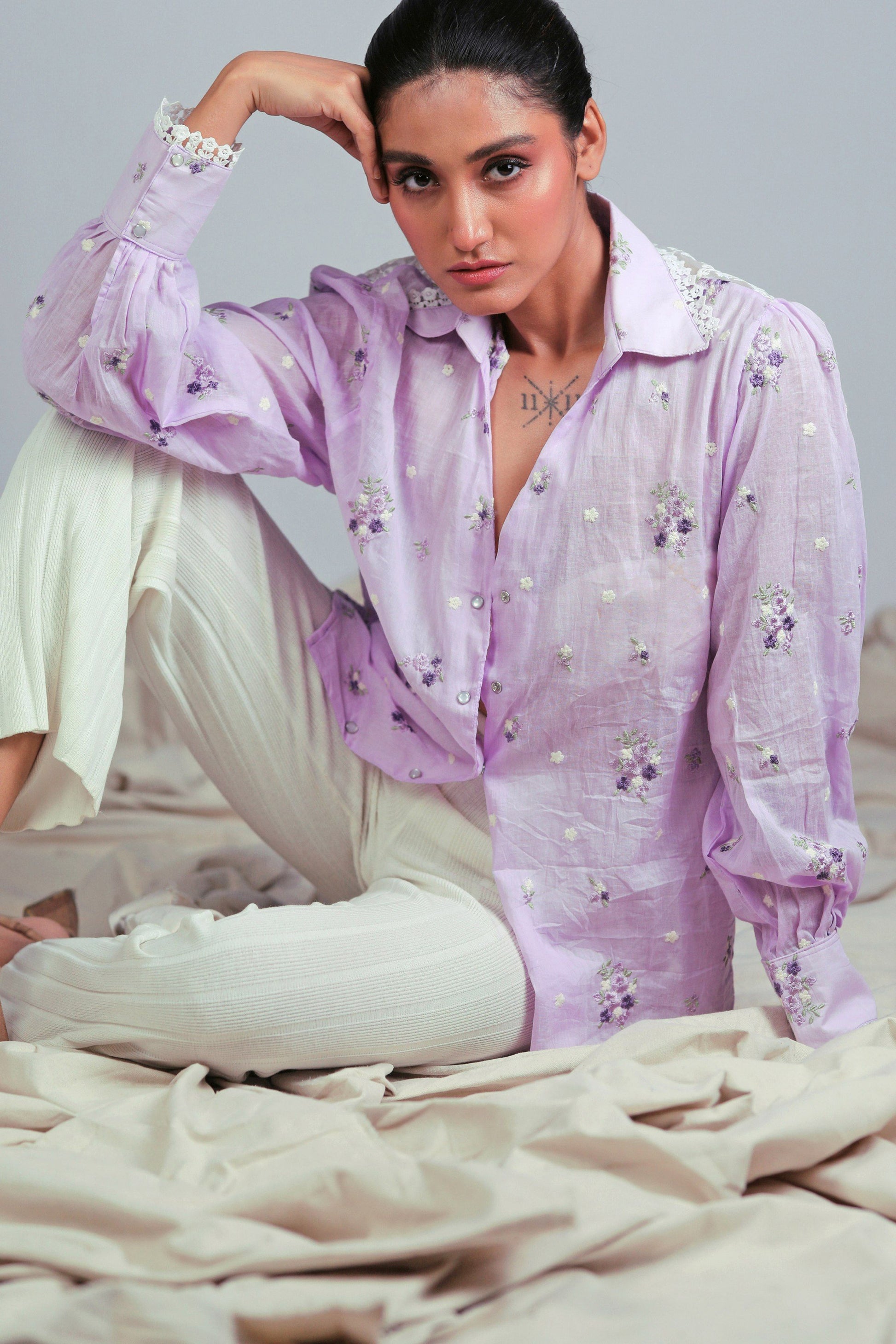 Lilac Lagoon oversized shirt by 66aura, featuring flowy fabric and relaxed fit, displayed on a hanger.