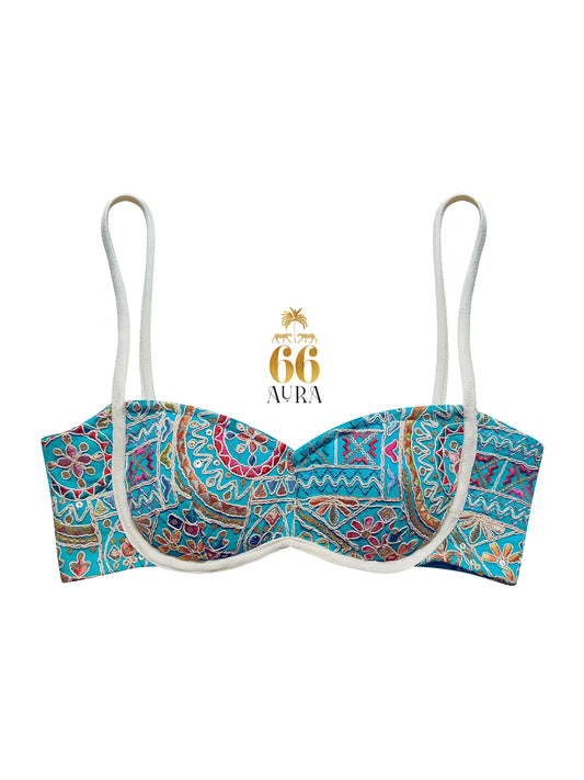Confetti cut bralette from 66aura featuring colorful confetti pattern and soft fabric, displayed on a hanger.