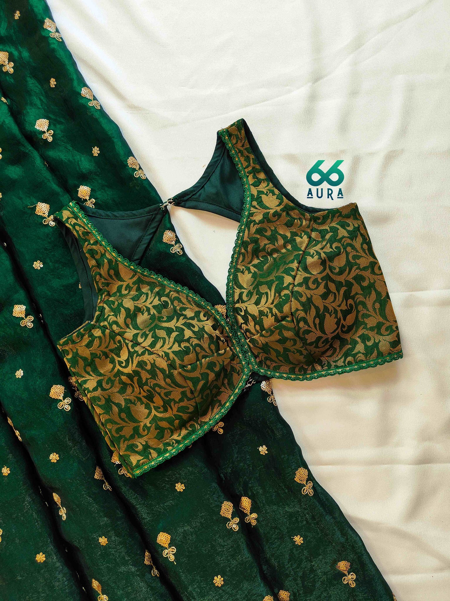 EMERALD AURA SLEEVELESS BLOUSE