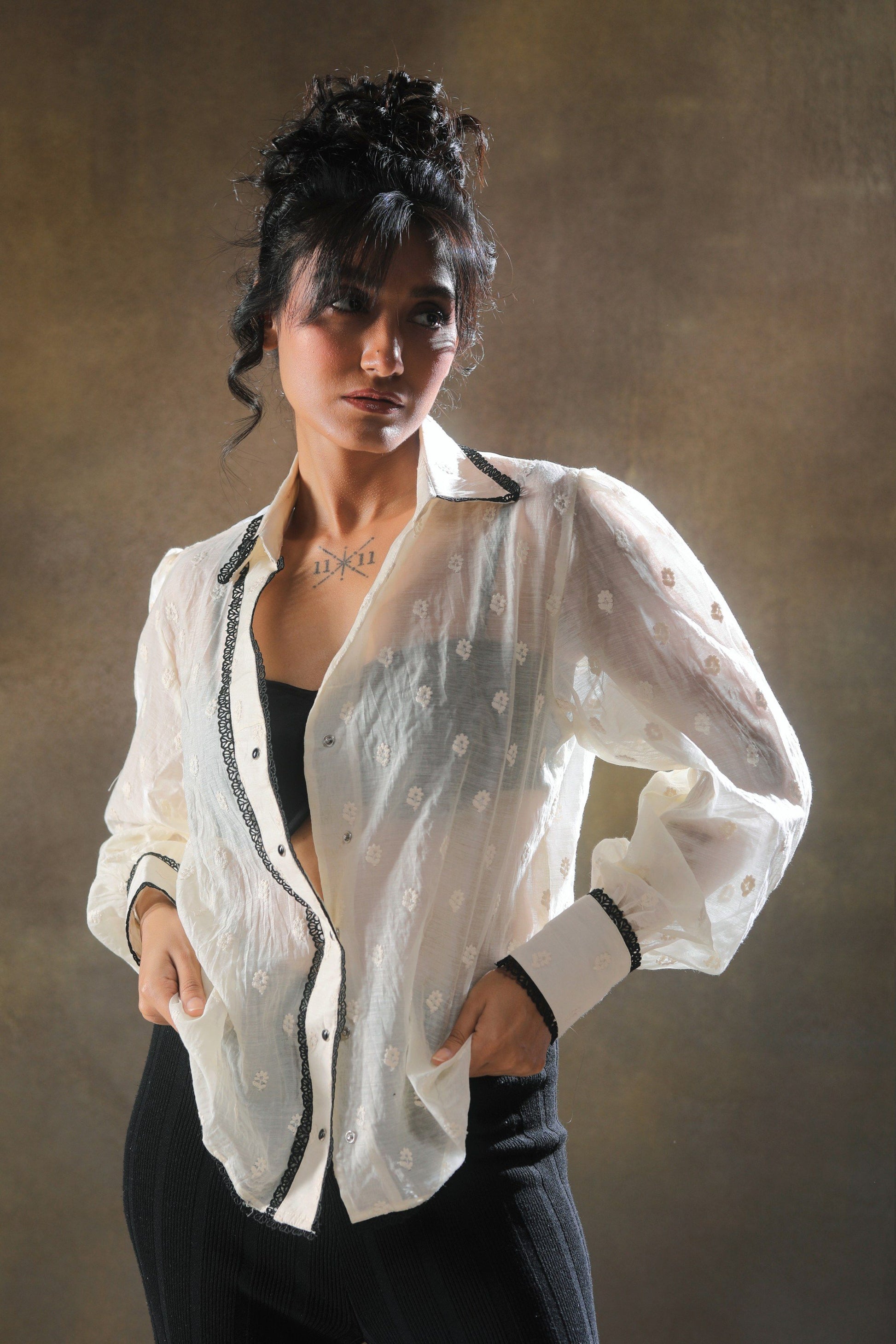 Oversized Blink Blink shirt by 66aura in soft fabric, shown in a relaxed fit with long sleeves and a casual style.