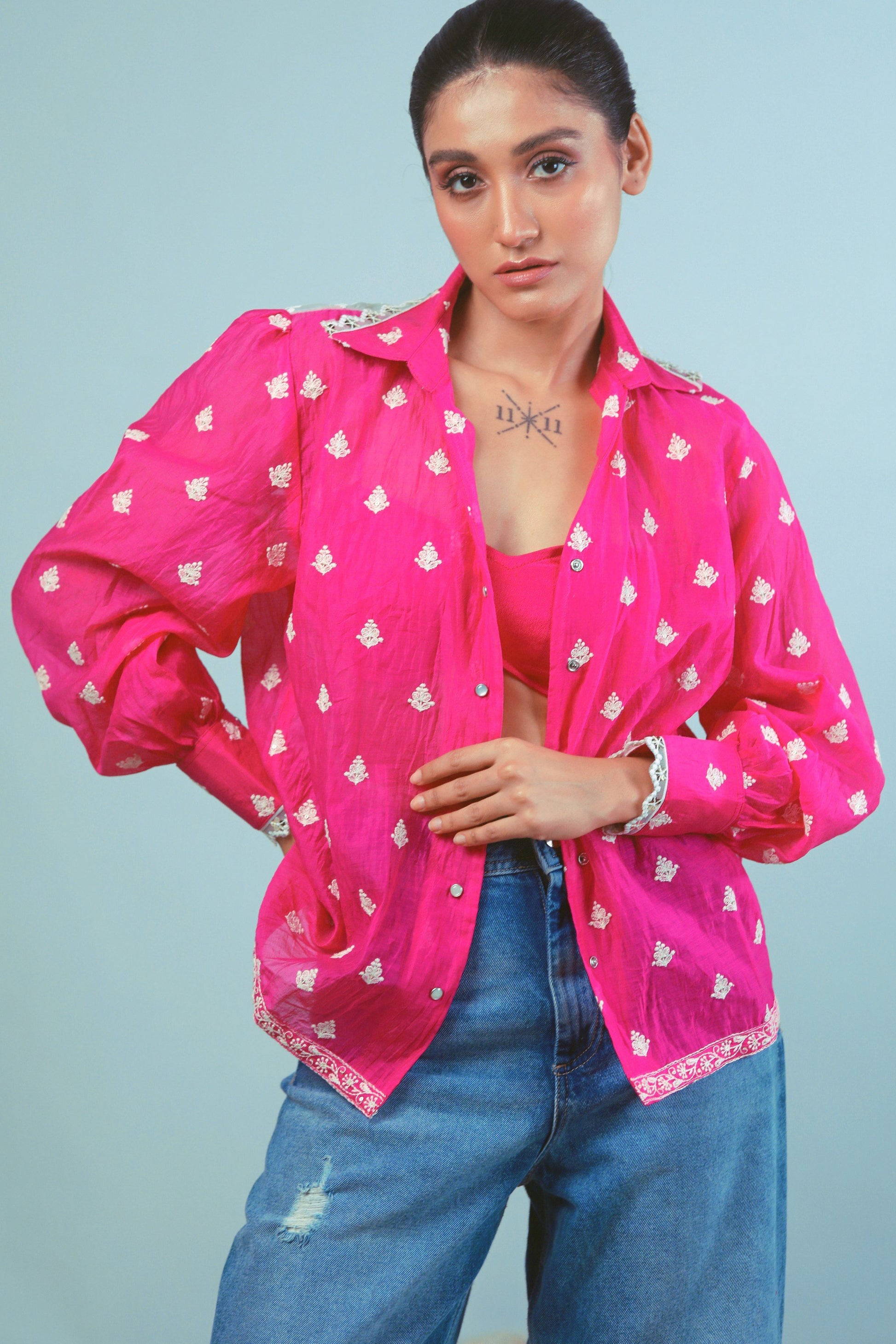 Oversized PING PING shirt by 66aura featuring a relaxed fit, soft fabric, and bold design, displayed on a hanger.