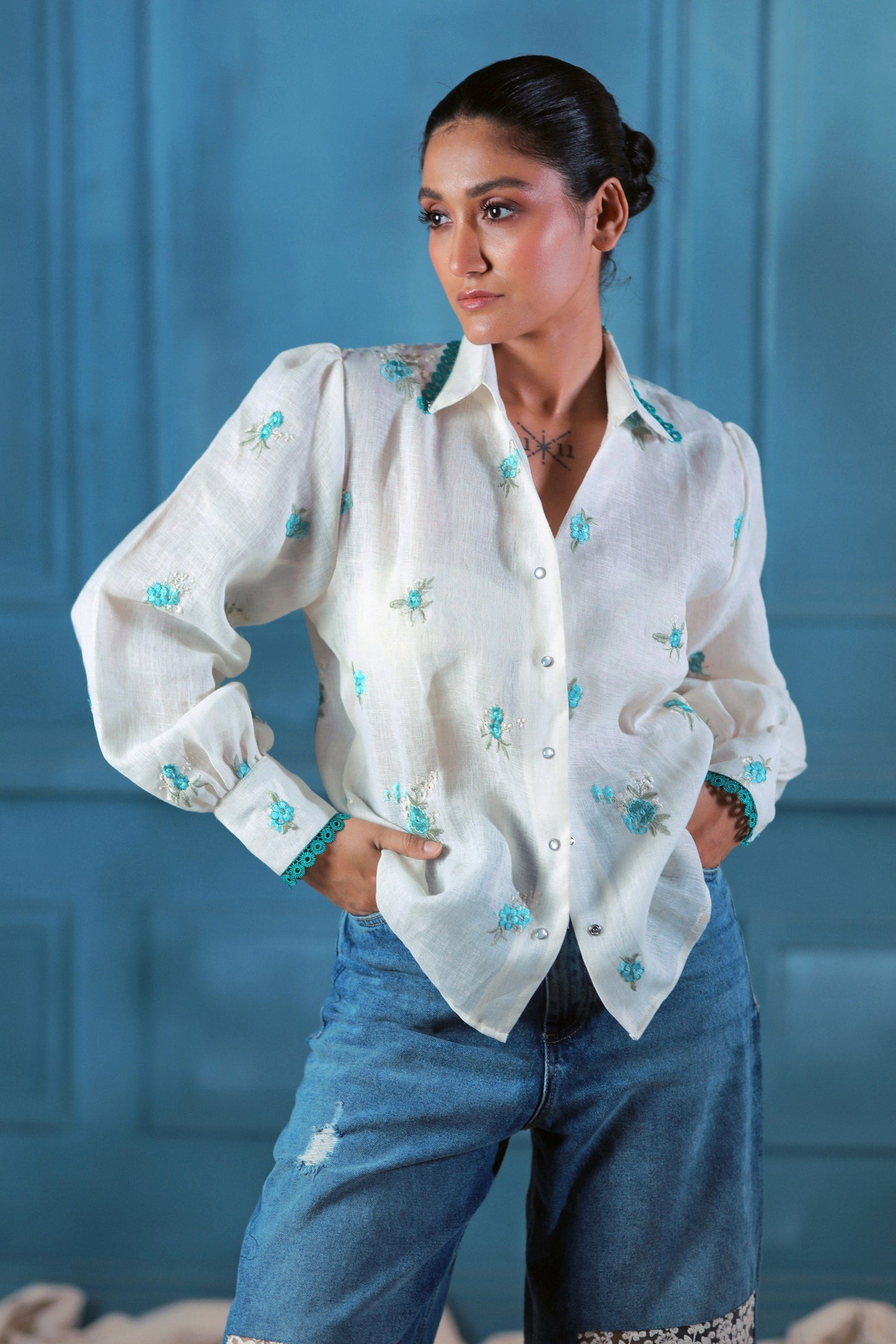 Oversized Chill Charm shirt by 66aura featuring a relaxed fit, soft fabric, and casual style, displayed on a hanger.