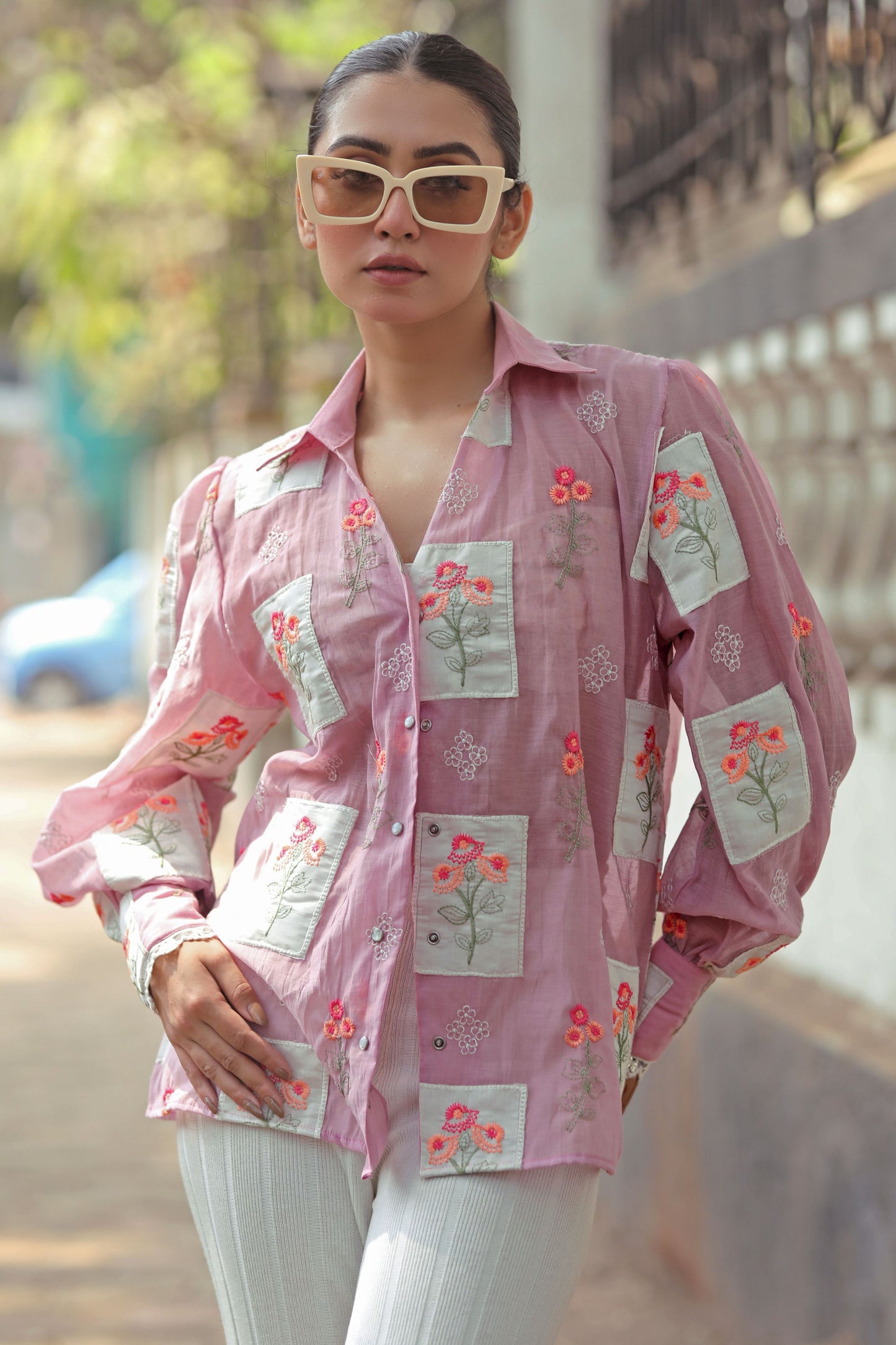 Lilac Loco Shirt by 66aura displayed on a hanger, featuring a soft lilac fabric with a relaxed fit and casual style.