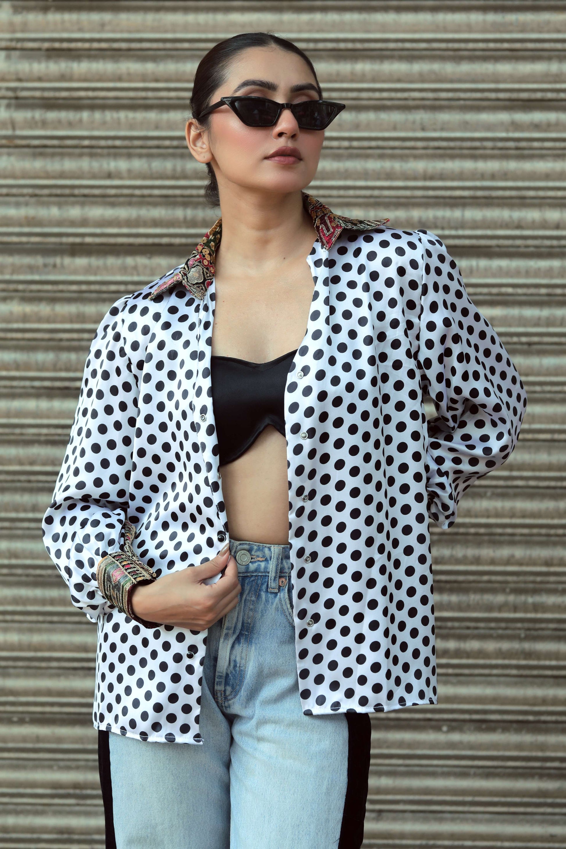 Black Plot Twist shirt by 66aura featuring a bold graphic design on the front, casual fit, and soft cotton fabric.