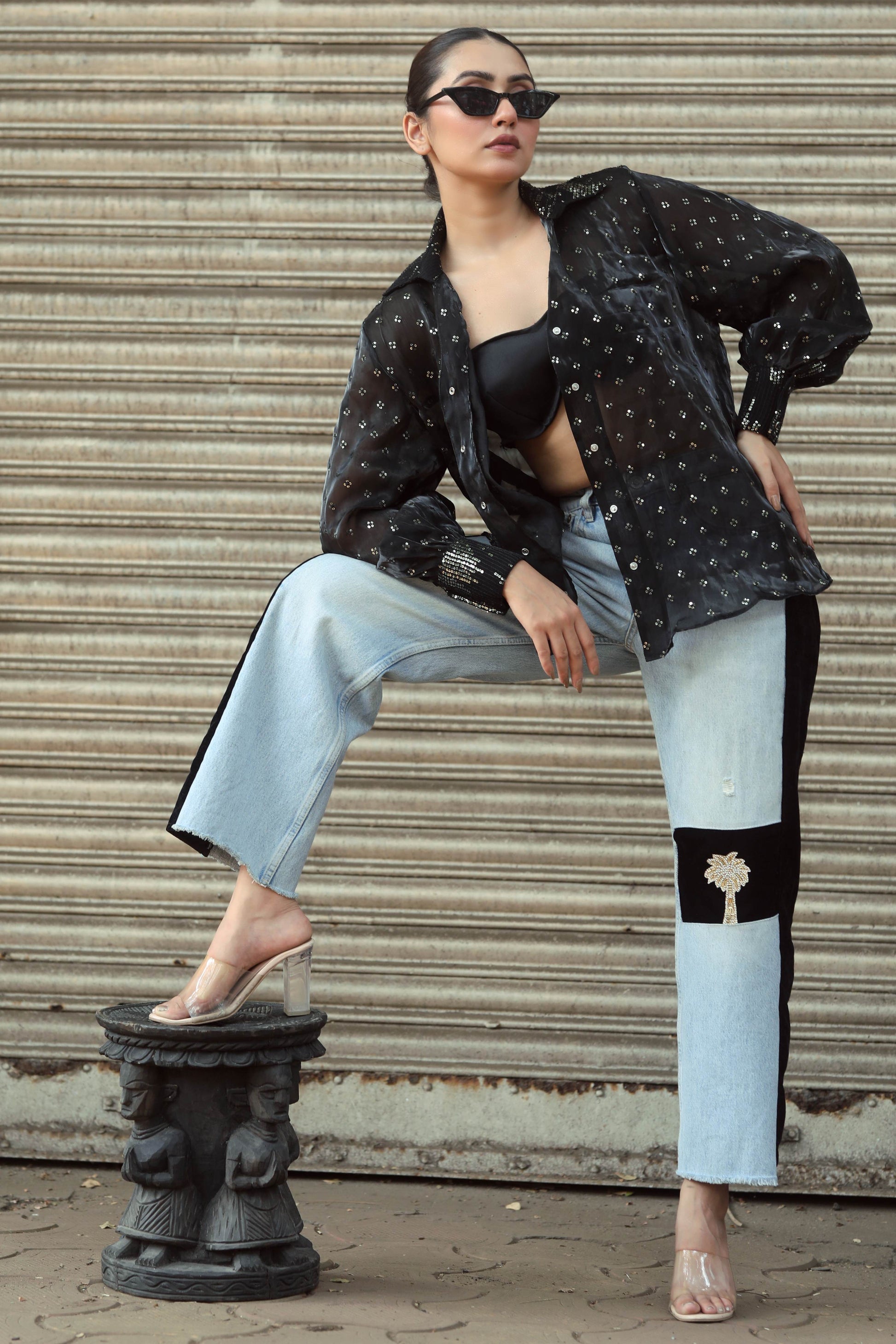 Pair of stylish BOSS BABE jeans by 66aura, showcasing classic denim fit and trendy design details on a neutral background.