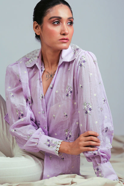 Light purple oversized shirt from 66aura with a relaxed fit, long sleeves, and a casual, comfortable style.