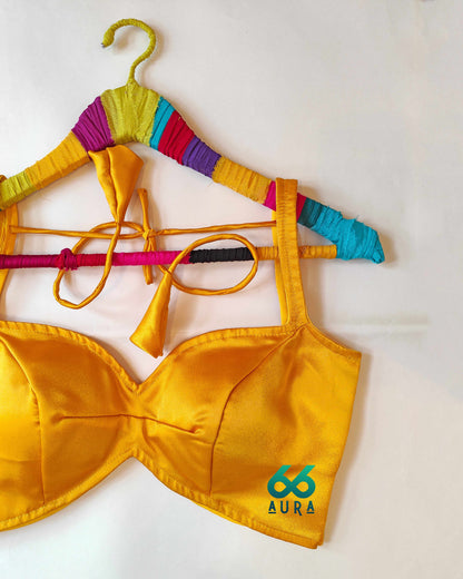 AMBER AURA SLEEVELESS BLOUSE