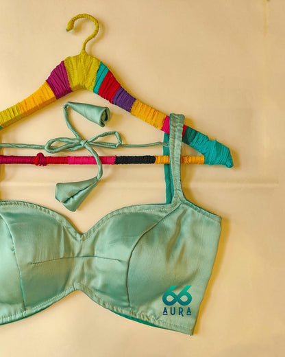 TEAL AURA SLEEVELESS BLOUSE