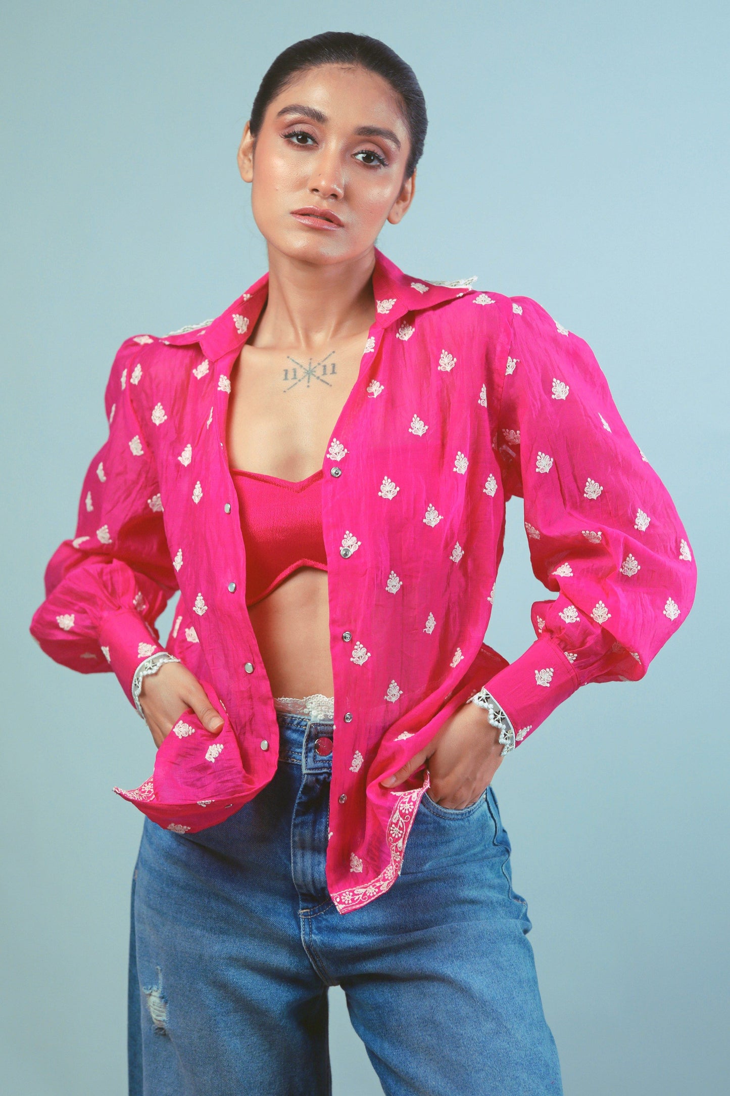 Oversized PING PING shirt by 66aura featuring a relaxed fit and casual style, shown on a hanger.