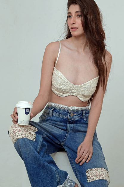 LUNA Lace Bralette by 66aura featuring delicate lace fabric and soft straps, displayed on a neutral background.