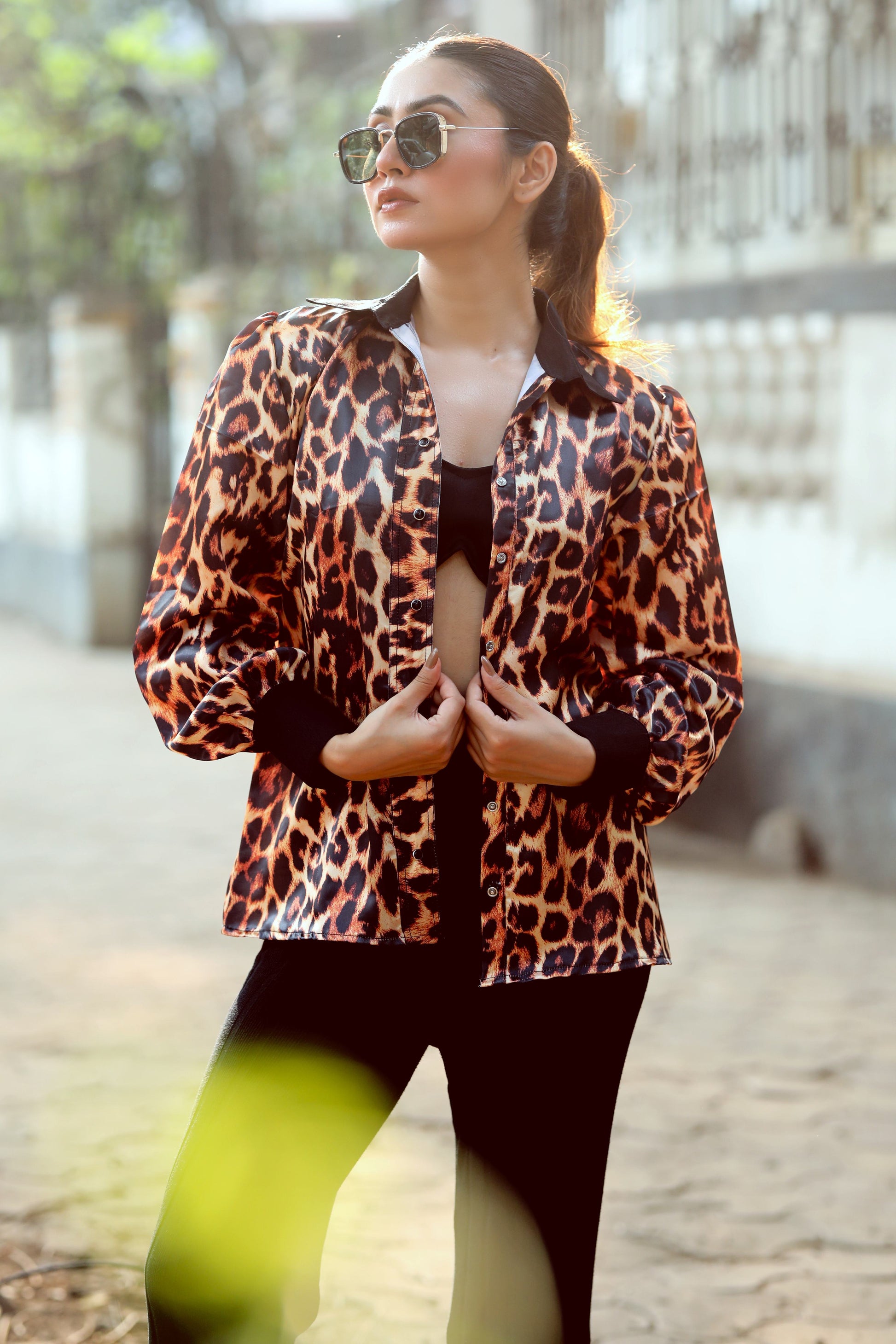 Black BOSS MOVE shirt by 66aura, featuring a casual fit with a button-up front and stylish collar, displayed on a hanger.