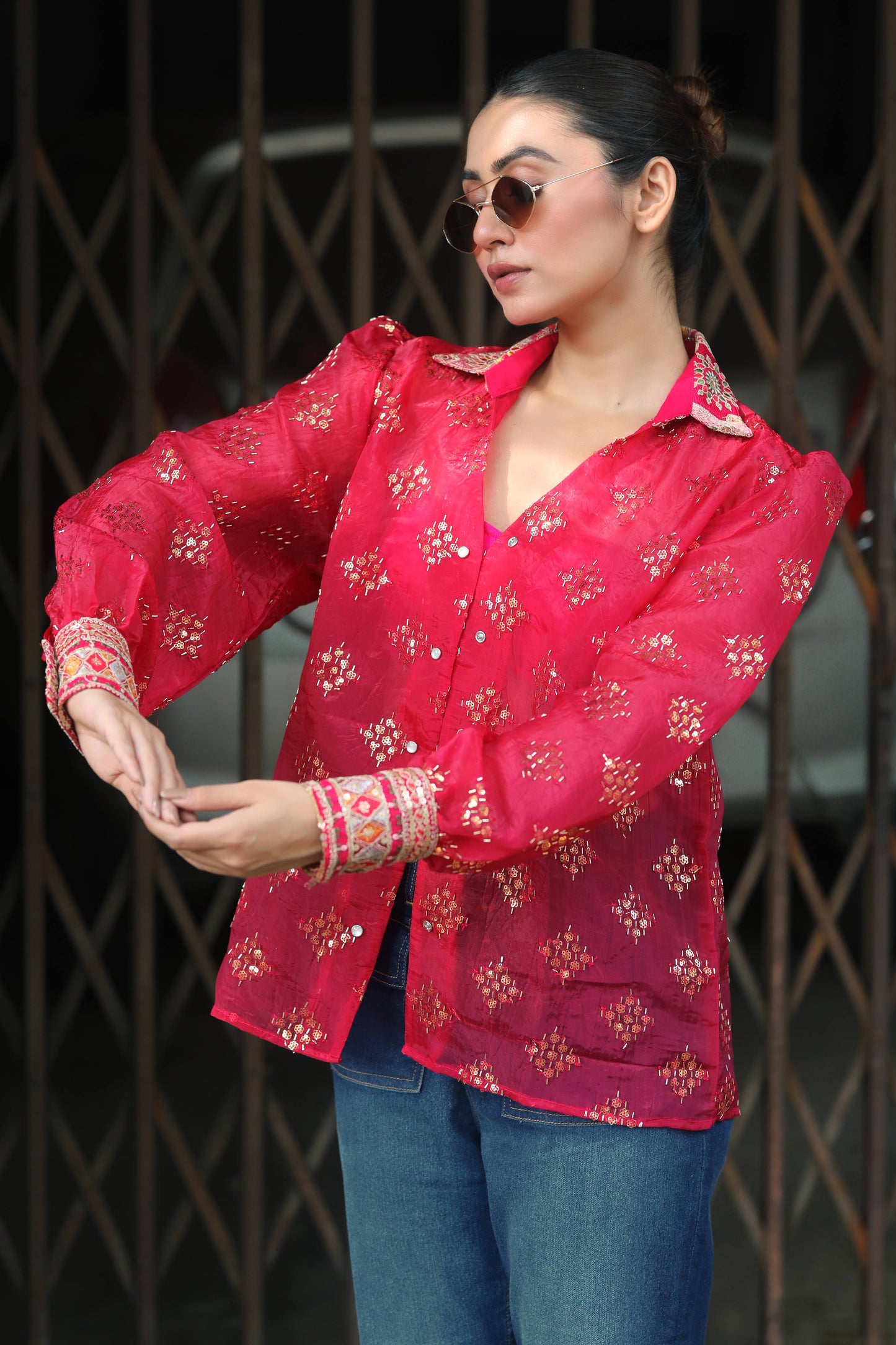 Black drip district shirt by 66aura with a relaxed fit and bold drip graphic design on the front.