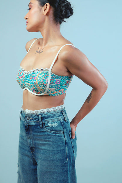 66aura Confetti Cut Bralette featuring colorful confetti pattern, soft fabric, and delicate straps for a stylish, comfortable fit.