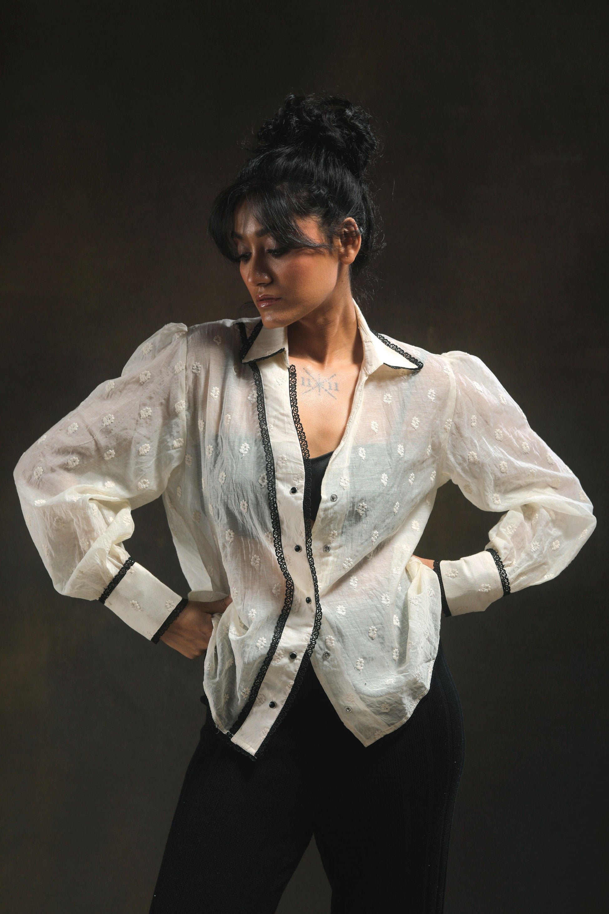 Oversized Blink Blink shirt by 66aura featuring a relaxed fit and casual style, displayed on a hanger against a neutral background.