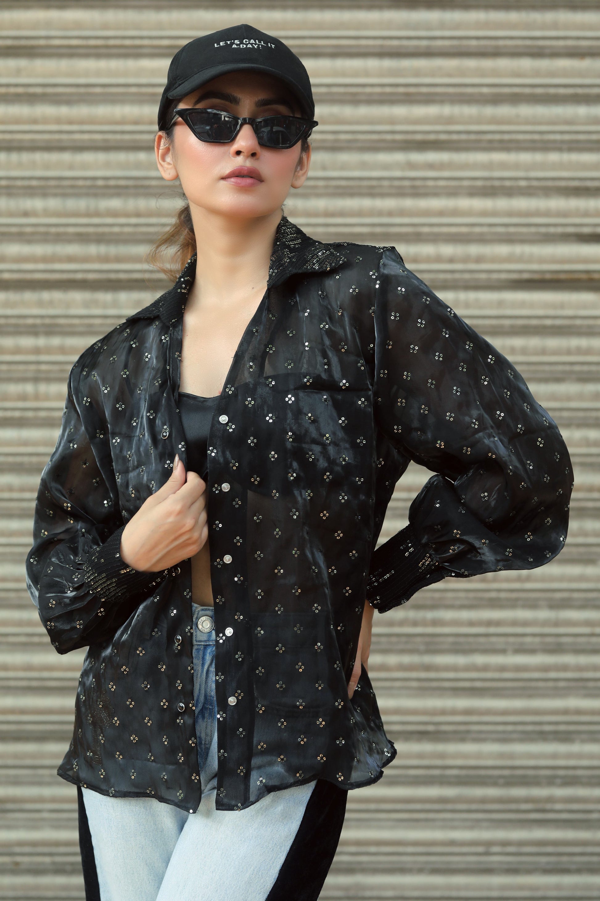 Main character shirt by 66aura featuring a bold graphic design, displayed on a flat lay with neutral background.