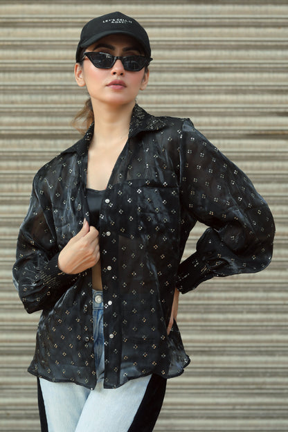 Main character shirt by 66aura featuring a bold graphic design, displayed on a flat lay with neutral background.