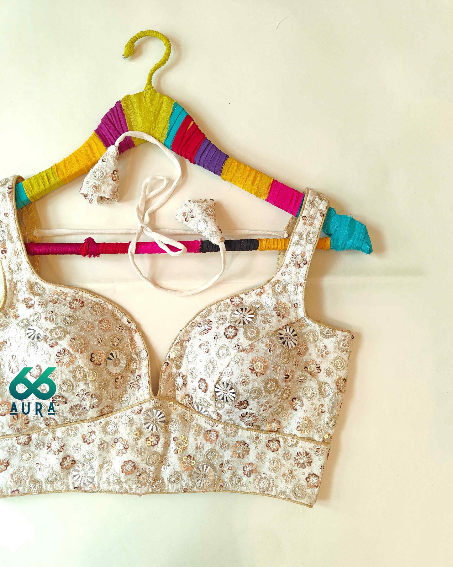 GLAM AURA SLEEVELESS BLOUSE