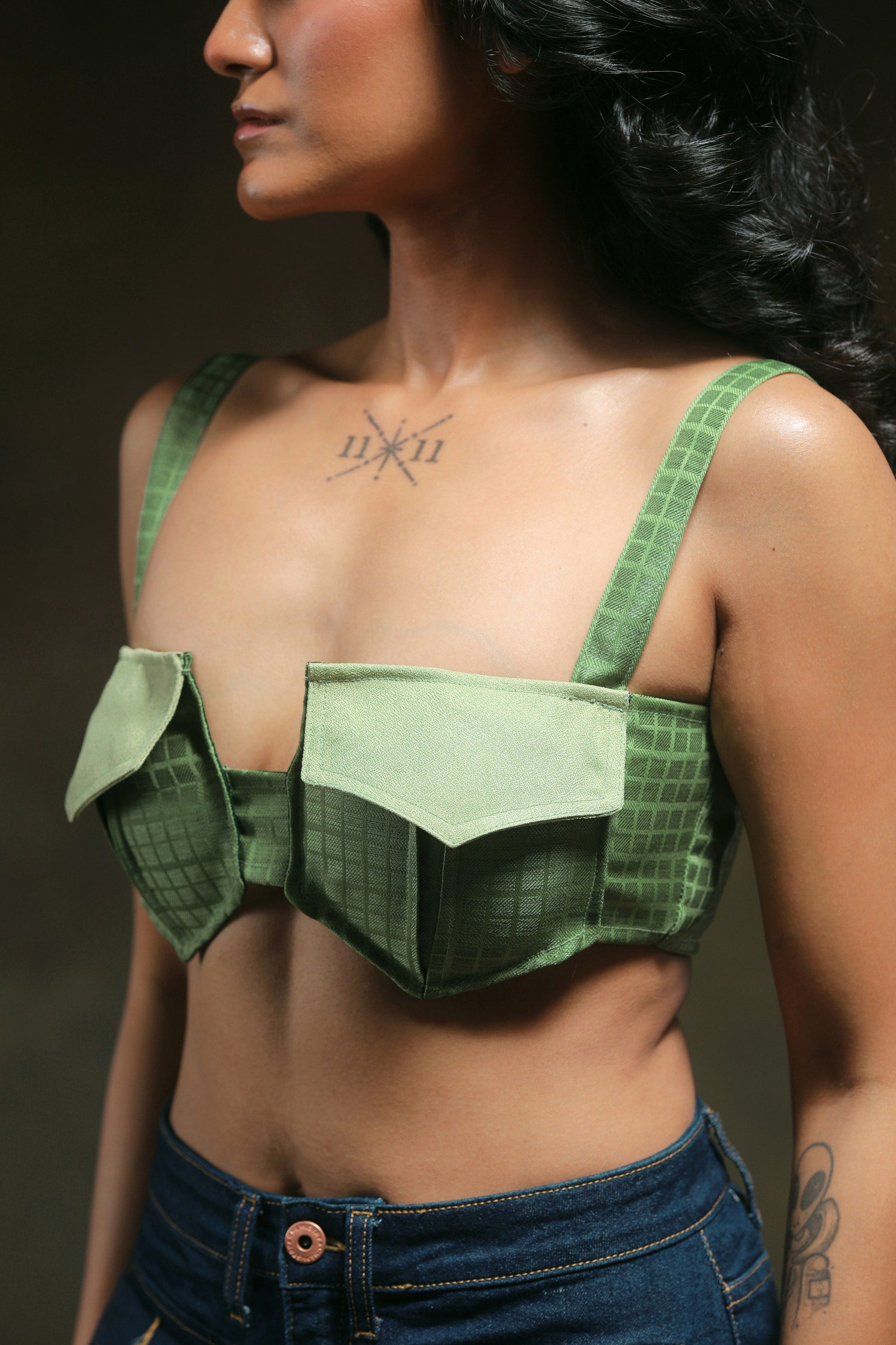 66aura Swipe Right Bralette featuring soft lace fabric and adjustable straps, shown on a hanger.