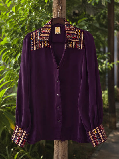 Oversized Toxic Teddy shirt by 66aura displayed on a hanger, featuring a bold graphic design and relaxed fit.