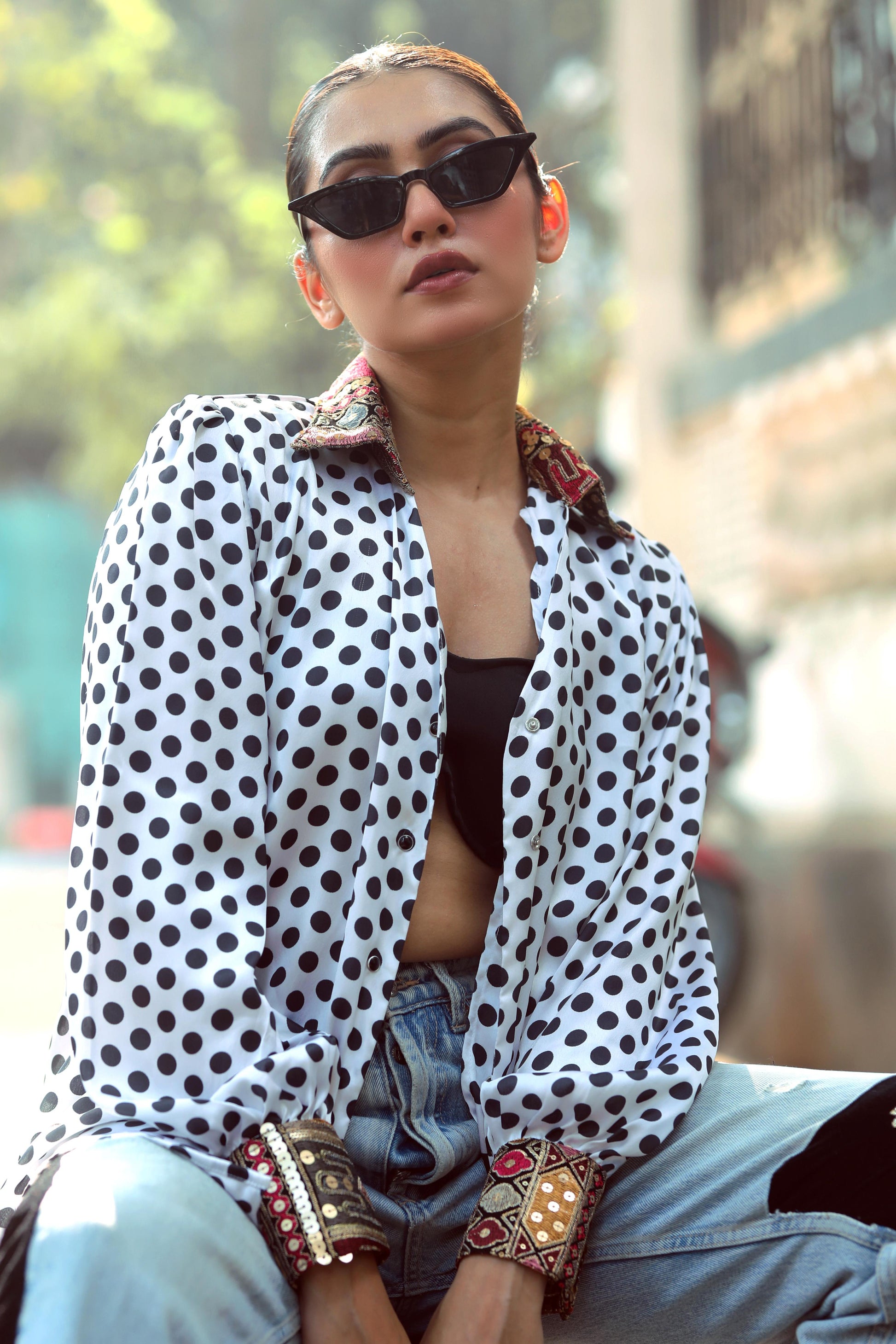 Black Plot Twist shirt by 66aura featuring bold graphic text on front, casual fit, and soft fabric.