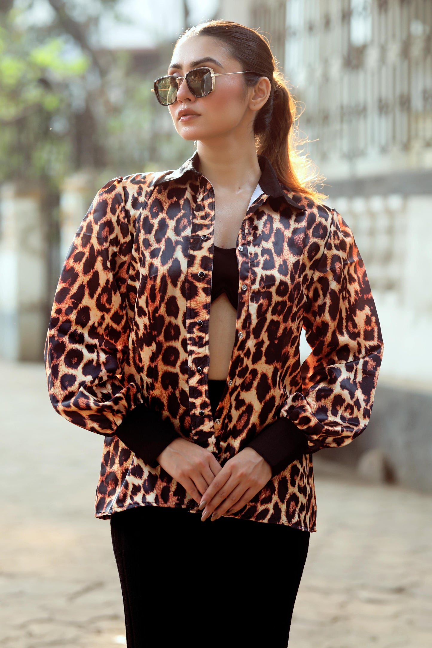 Black BOSS MOVE shirt by 66aura, featuring a sleek fit and stylish design, displayed on a hanger against a neutral background.