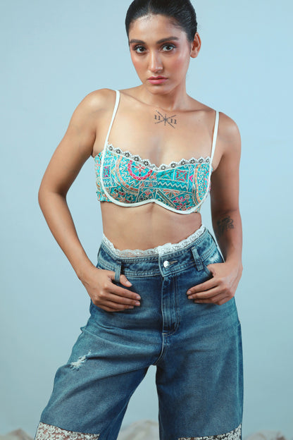 Confetti Cut Bralette by 66aura featuring colorful confetti pattern, soft fabric, and delicate straps.