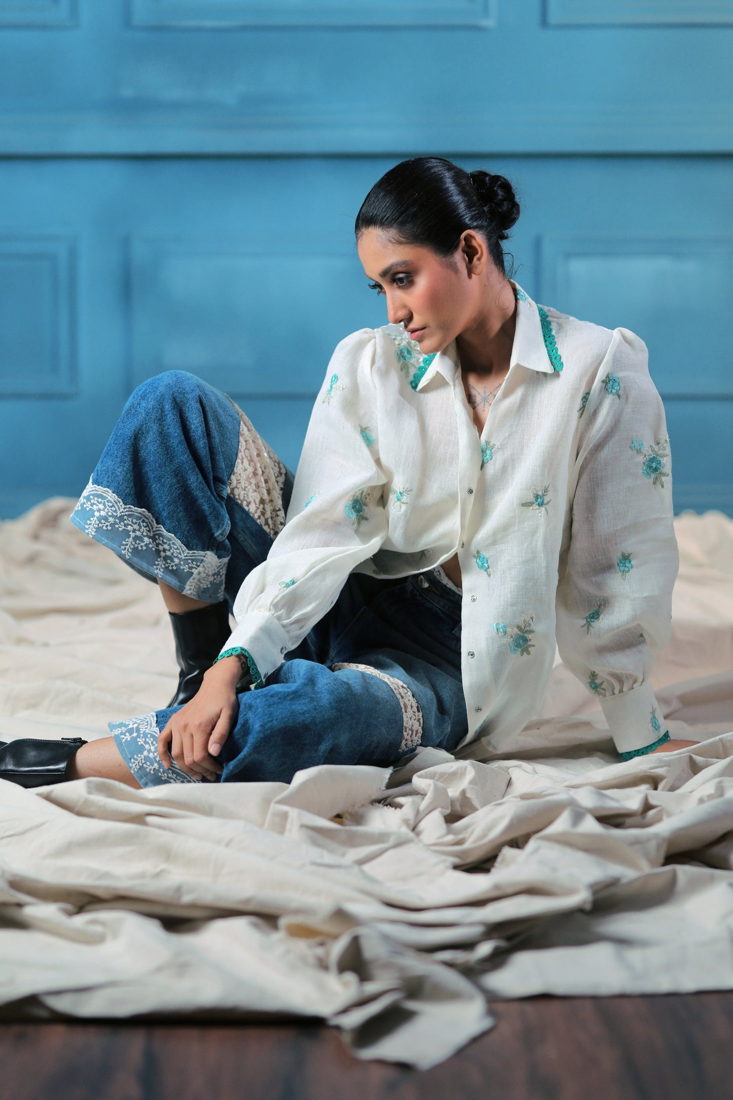 66aura Chill Charm oversized shirt in soft fabric, featuring relaxed fit and stylish design, displayed on a hanger.