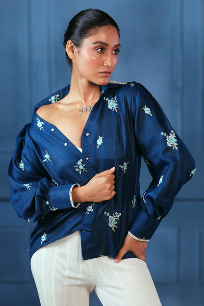 Navy Nexus oversized shirt by 66aura, featuring a relaxed fit with long sleeves and a button-down front, styled on a mannequin.