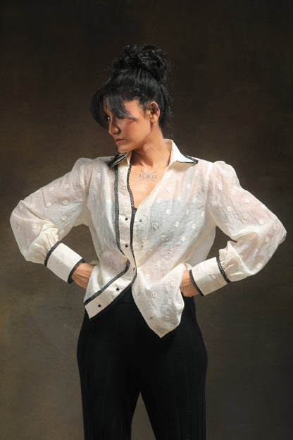 Oversized Blink Blink shirt by 66aura in soft fabric, shown draped on a hanger with a relaxed fit and casual style.