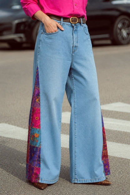 66aura Guilty Pleasure Jeans showcasing stylish denim with a fitted design and classic five-pocket style.