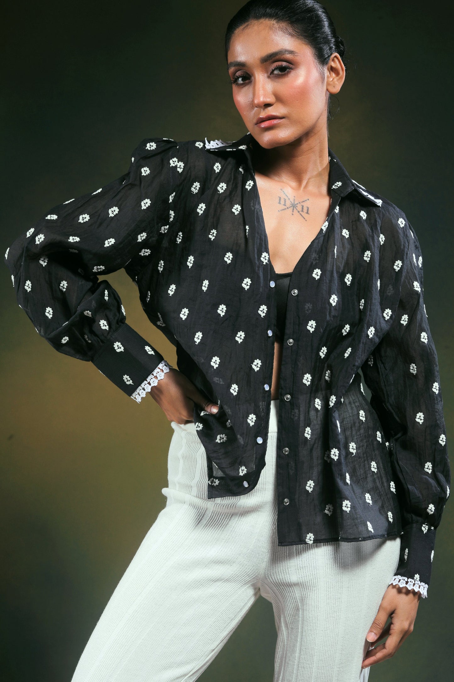 Oversized Shadow Sync shirt by 66aura, featuring a relaxed fit and stylish design, shown on a model against a neutral background.