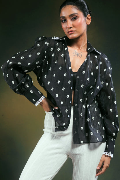 Oversized Shadow Sync shirt by 66aura, featuring a relaxed fit and stylish design, shown on a model against a neutral background.