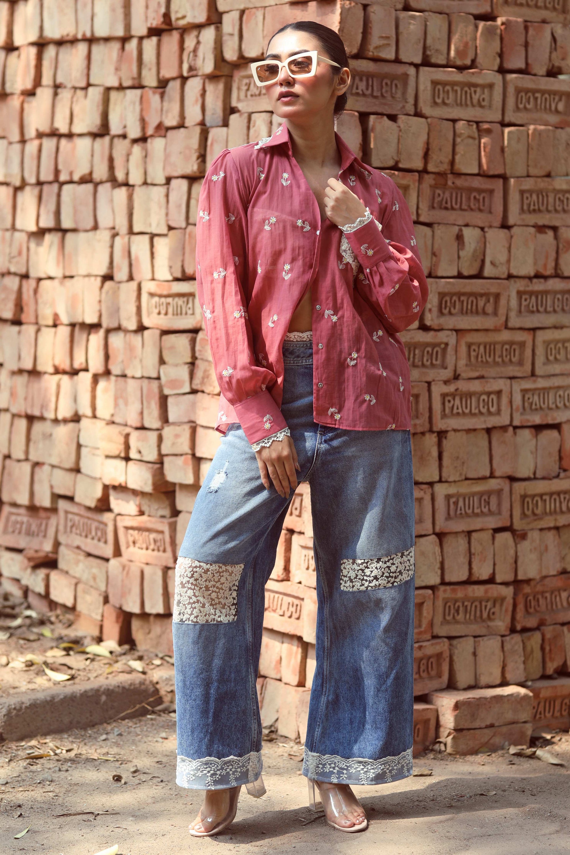 Light pink cotton candy shirt by 66aura featuring soft fabric and casual fit, displayed on a hanger against a neutral background.