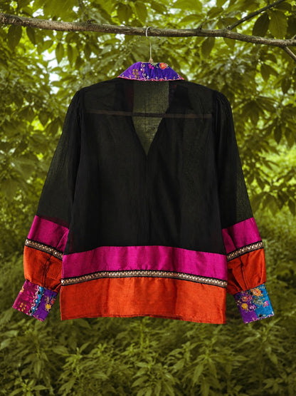 Oversized twin trouble shirt by 66aura, displayed in a relaxed fit with bold graphic design on soft fabric.