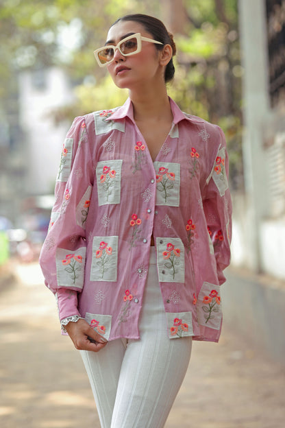 Lilac Loco Shirt by 66aura featuring a relaxed fit and stylish design, displayed on a hanger with a plain background.