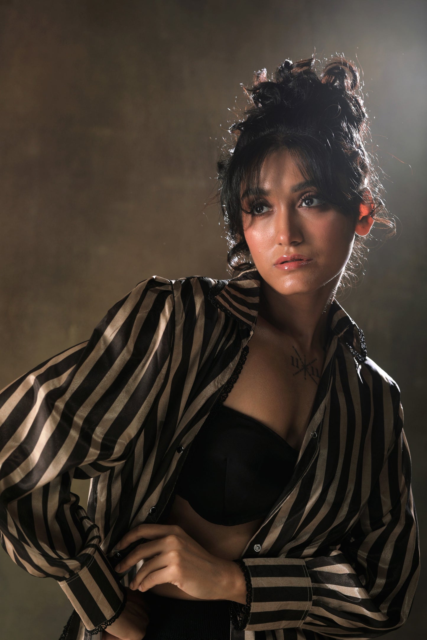 Oversized striped shirt from 66aura featuring bold horizontal stripes and a relaxed fit on a model.