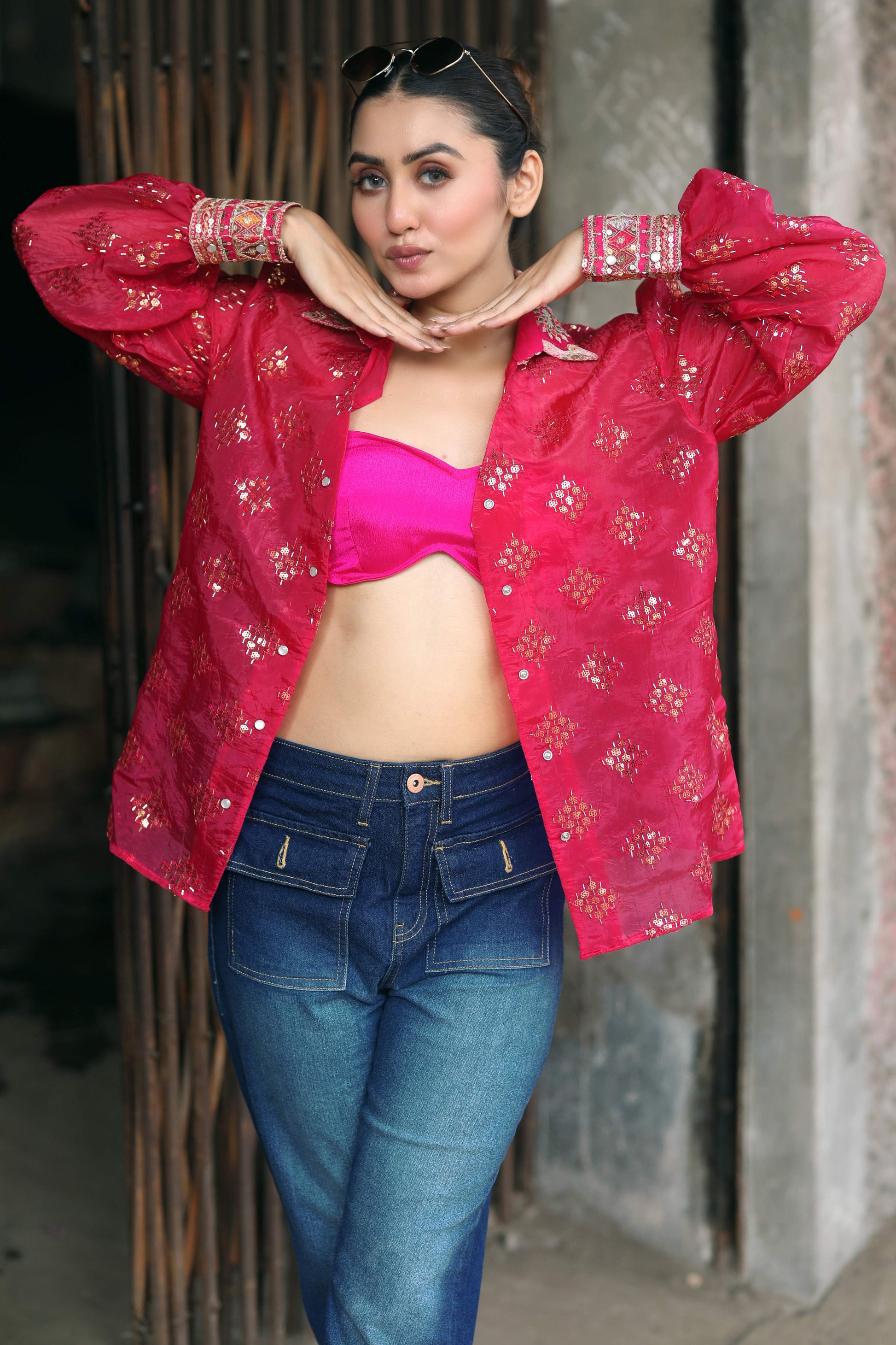 Black drip district shirt by 66aura with bold graphic print, short sleeves, and casual fit displayed on a hanger.