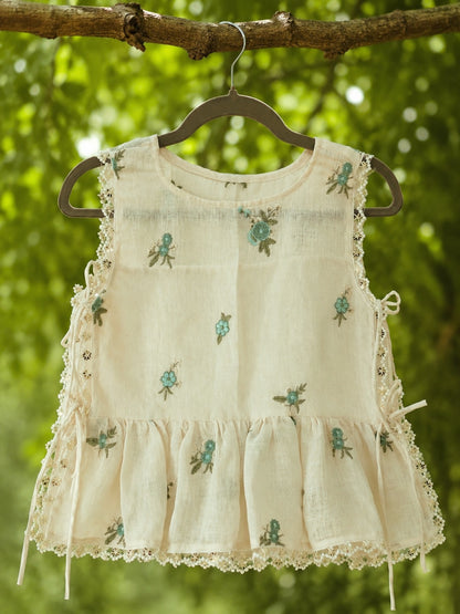 66aura Monaco Muse Top featuring a stylish, flowy design with a flattering neckline and soft fabric in a vibrant color.