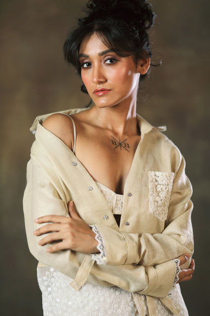 Tan Twist oversized shirt by 66aura, featuring a relaxed fit and casual style, displayed on a model against a neutral background.