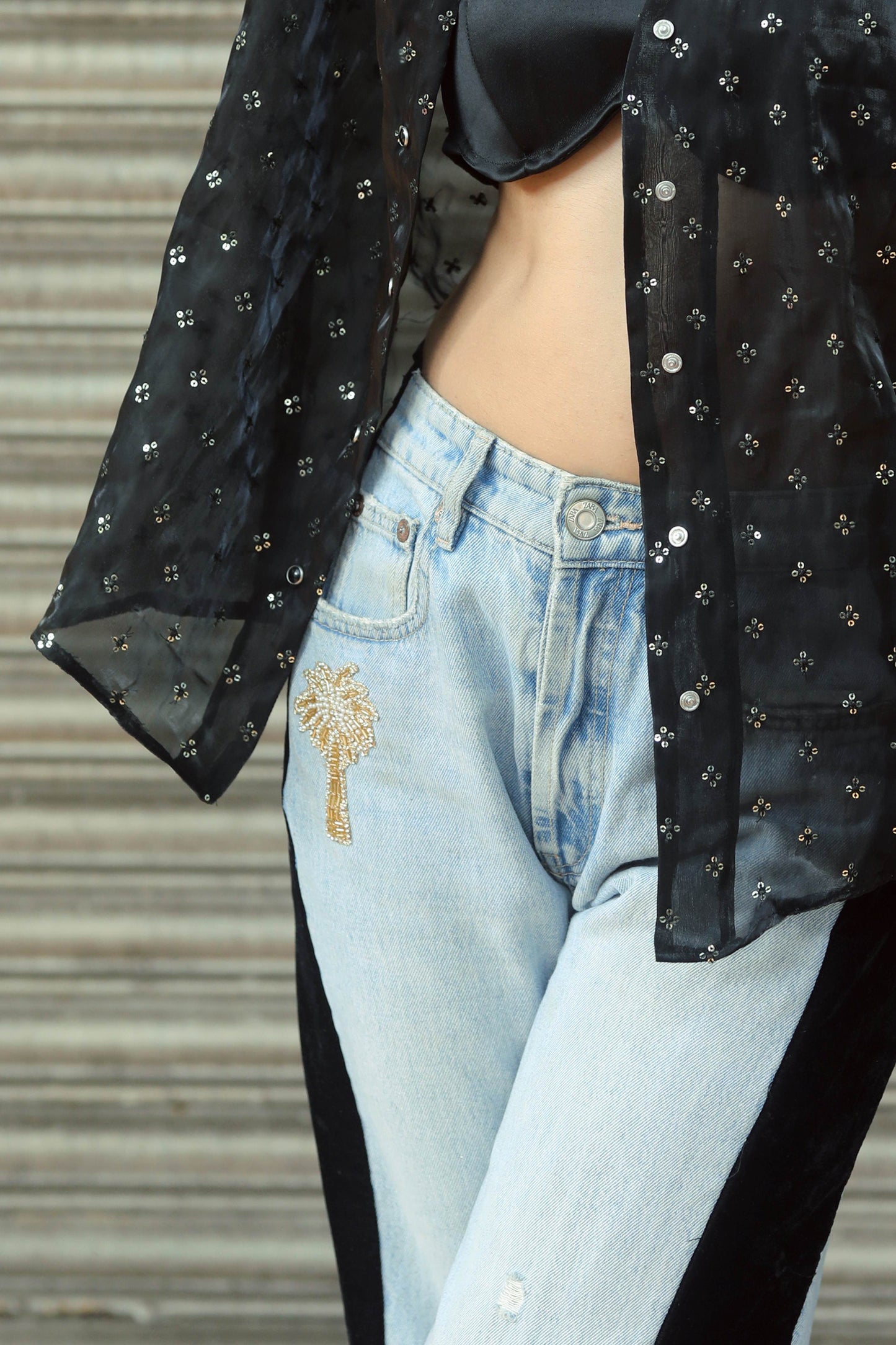 High-waisted BOSS BABE jeans by 66aura featuring a classic blue denim look and stylish fit.