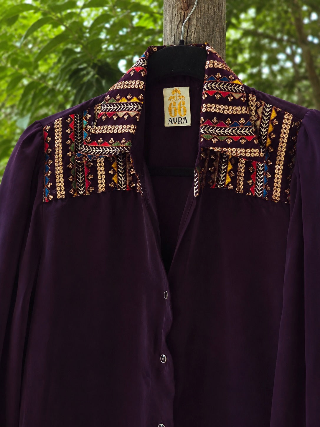 Oversized Toxic Teddy shirt by 66aura featuring bold graphic print and relaxed fit, shown on a model.
