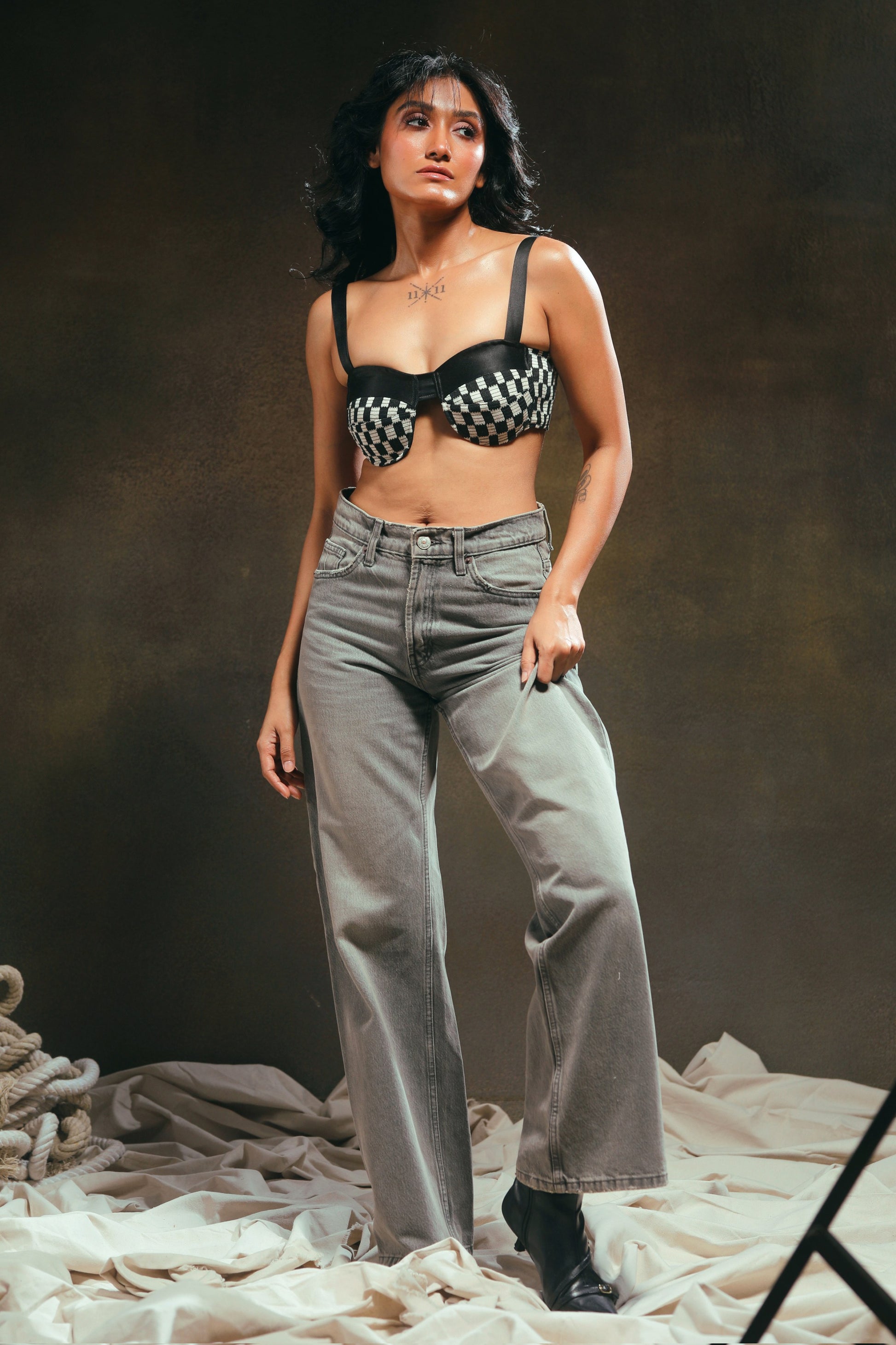 66aura Cubicle Crush Bralette shown on a model, featuring soft fabric, adjustable straps, and a comfortable fit.