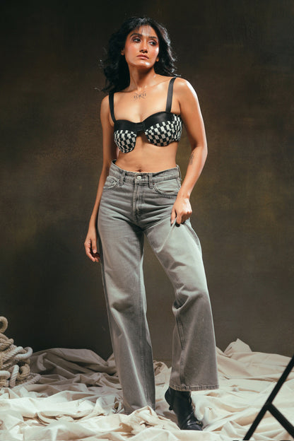 66aura Cubicle Crush Bralette shown on a model, featuring soft fabric, adjustable straps, and a comfortable fit.