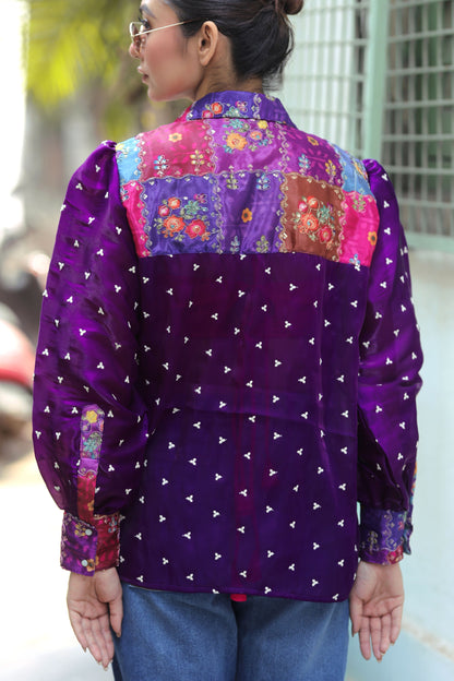 Offbeat OG shirt by 66aura displayed on a hanger, featuring a casual design with a relaxed fit and stylish graphics.