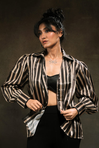 Oversized stripe spin shirt by 66aura featuring bold horizontal black and white stripes and a relaxed fit.