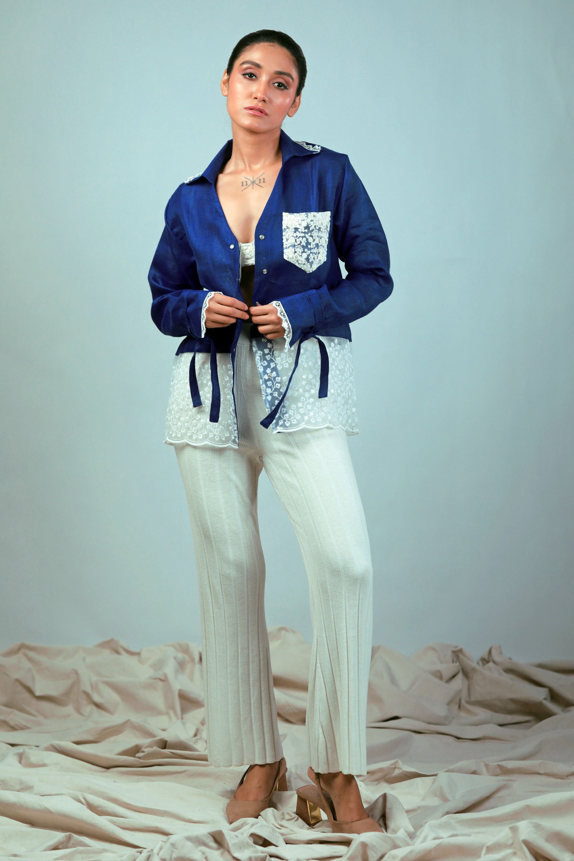 Cobalt Crush oversized shirt by 66aura displayed flat with long sleeves and a relaxed fit, showcasing casual streetwear style.