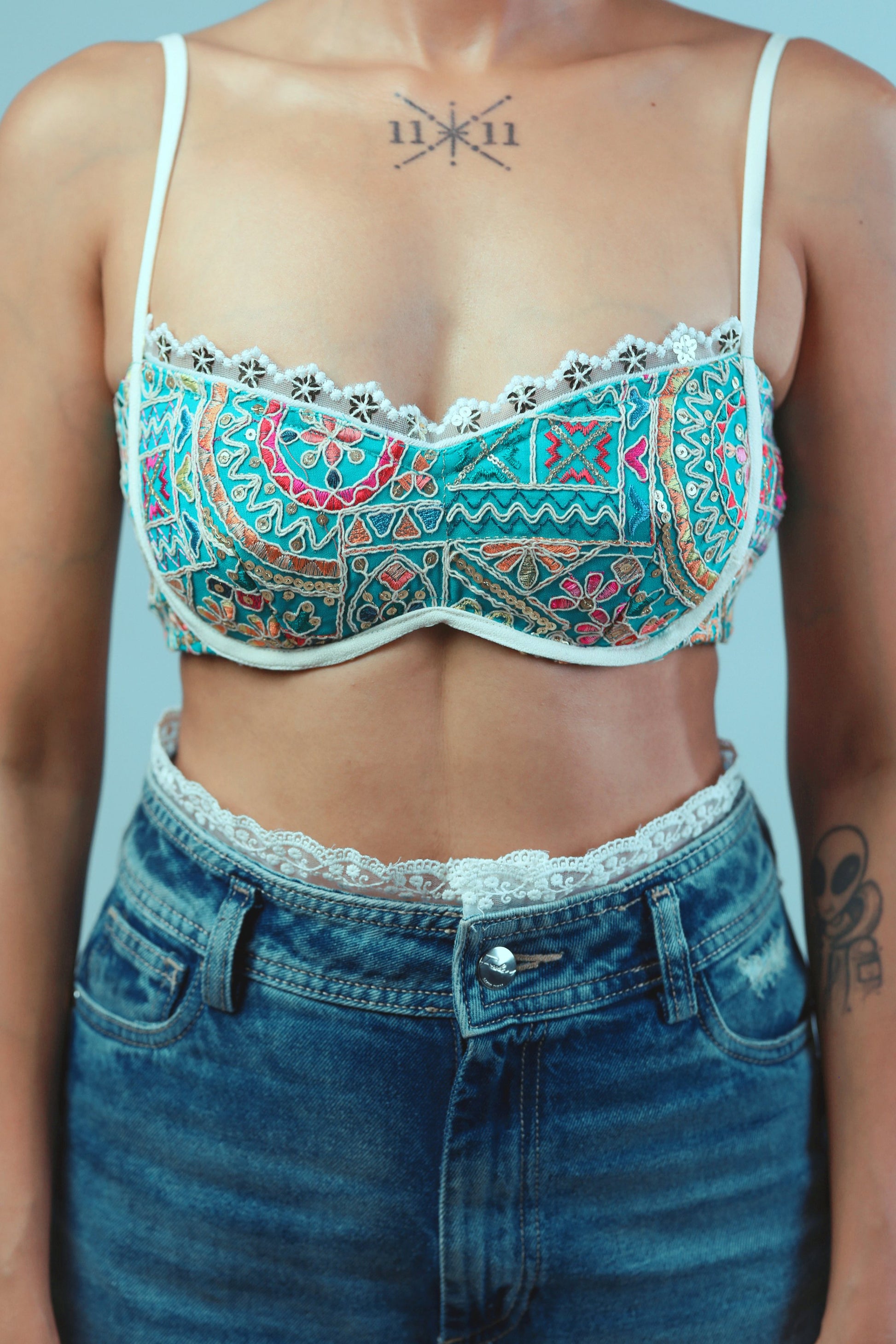 Confetti Cut Bralette by 66aura featuring colorful confetti-style fabric and soft, supportive design.