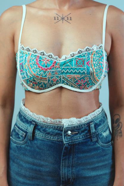 Confetti Cut Bralette by 66aura featuring colorful confetti-style fabric and soft, supportive design.